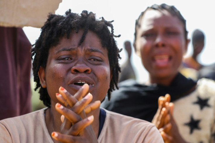 African migrants plead to be saved from a desert zone between Libya and Tunisia on July 26, 2023, weeks after Tunisian authorities allegedly dumped dozens of them there