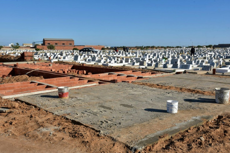 Graves are prepared to bury the bodies of migrants who drowned at sea and were recovered by the Tunisian coast guard, at the Barkallah cemetery in Sfax, on April 28, 2023
