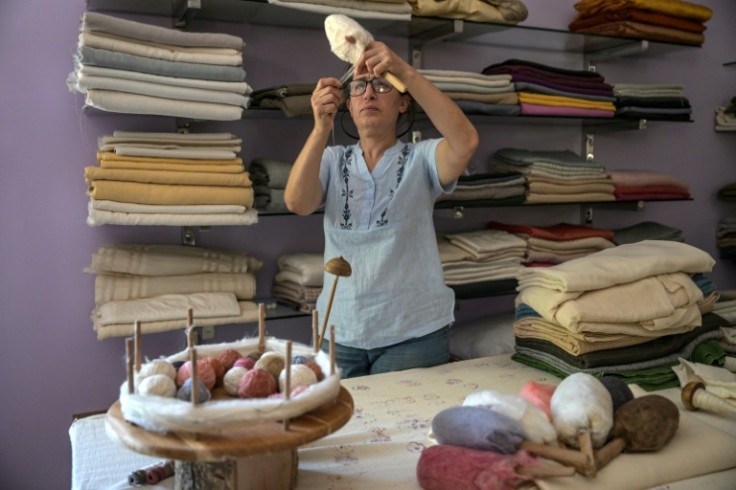 At the cooperative each cocoon is stretched out to a thread of up to 1,700 metres of silk thread
