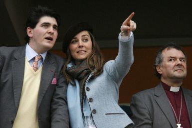 Middleton, girlfriend of Britain&#039;s Prince William, and unidentified friend react while watching on the final day of the Cheltenham Festival