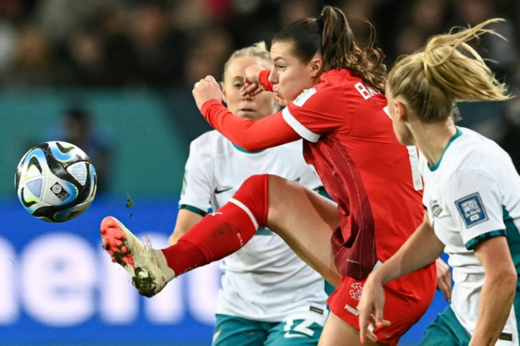 Switzerland's forward #10 Ramona Bachmann (C) controls the ball during a match against New Zealand