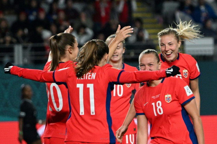 Norway players celebrate their fourth goal