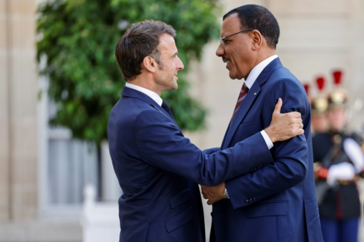 Allies: French President Emmanuel Macron, left, greets Niger President Mohamed Bazoum at the Elysee Palace on June 23