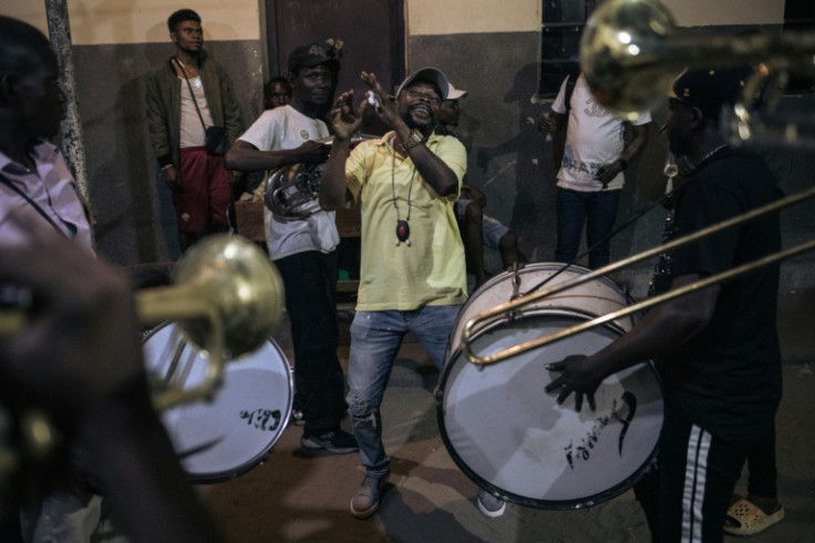 Party time: Voodoo wrestling contests are hugely popular in rundown neighbourhoods of Kinshasa