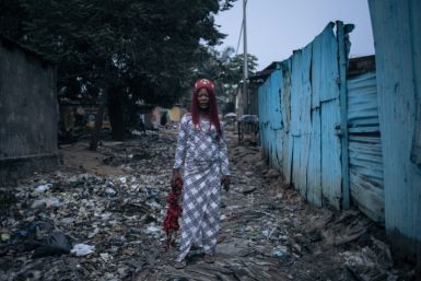Between bouts: Voodoo wrestler Maitresse Libondans poses for a photograph in Kinshasa's Selemenbao district