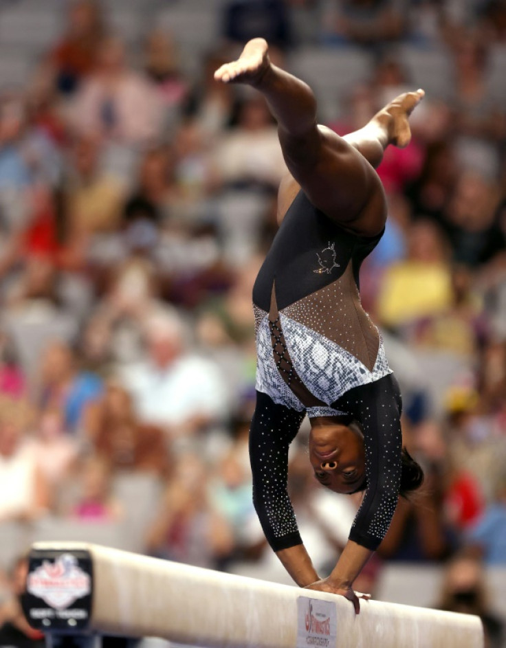 Simone Biles says she has conquered her fear of the "twisties" ahead of her comeback