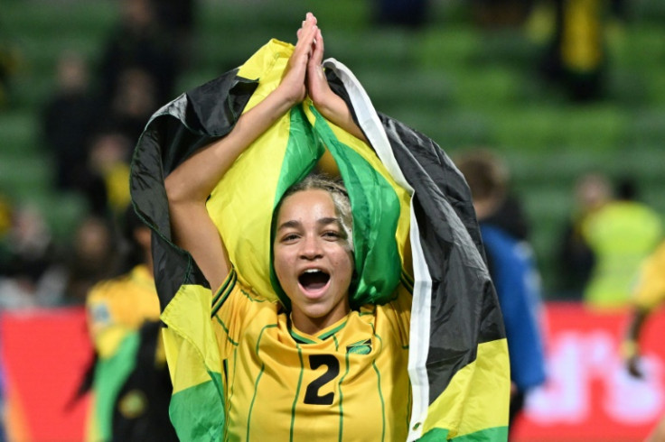 Jamaica midfielder Solai Washington celebrates after her team qualified for the last 16