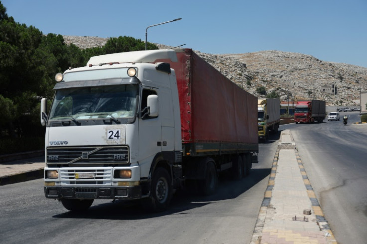 An aid convoy enters rebel-held northwestern Syria last month after passing through the Bab al-Hawa crossing on the border with Turkey