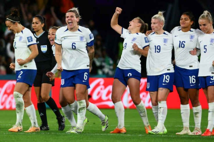 England players celebrate after beating Nigeria on penalties in the last 16