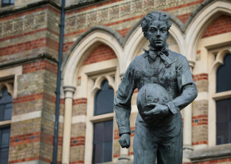 Graham Ibbeson's bronze statue outside Rugby School of William Webb Ellis was unveiled by former England centre Jeremy Guscott in 1997