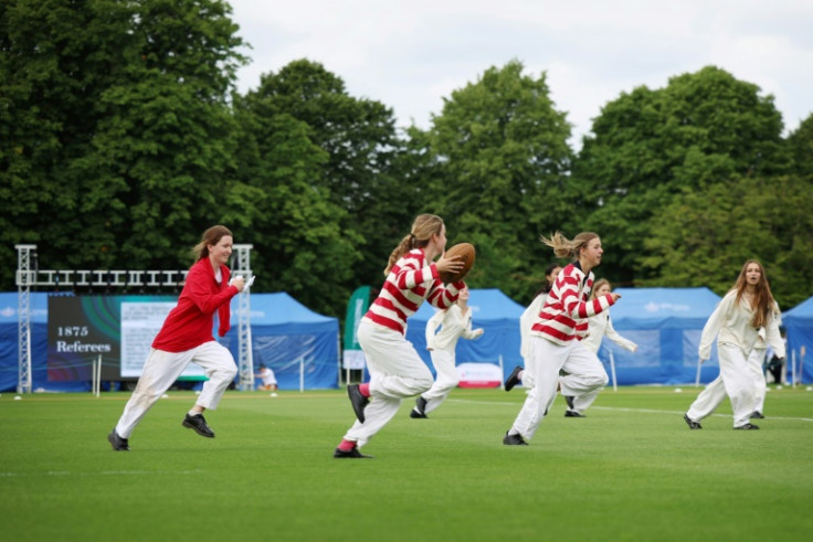 Pupils of Rugby School act out the introduction of referees to rugby in 1875 as part of the re-enactment of the development of the game over 200 years for the bicentenary celebration