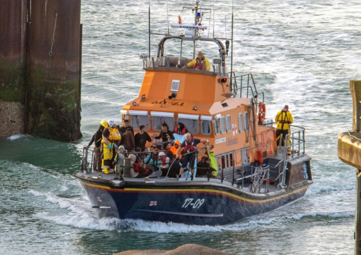 Coastguards said two people were still missing after the boat carrying more than 60 people capsized