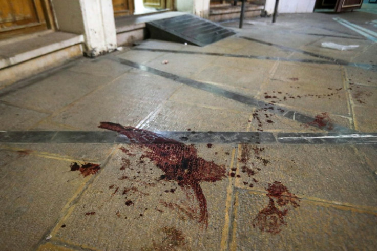 Blood stains the floor after the fatal attack at Iran's Shah Cheragh mausoleum in Shiraz, the capital of Fars province