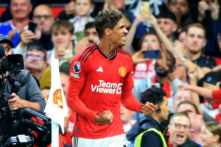 Raphael Varane celebrates after scoring the winner for Manchester United against Wolves