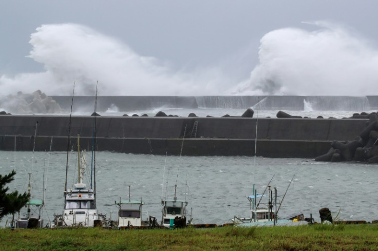 Typhoon Lan smashed into Japan's main island of Honshu packing gusts up to 144 kilometres per hour