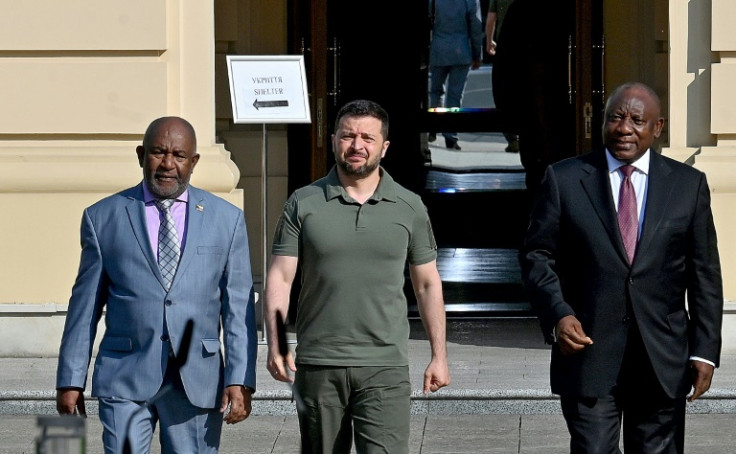(l to r) Comoros President Azali Assoumani, Ukraine's President Volodymyr Zelensky and South Africa's President Cyril Ramaphosa prepare to address the media after talks in Kyiv in June, when. Ramaphosa led an African peace mission to Ukraine