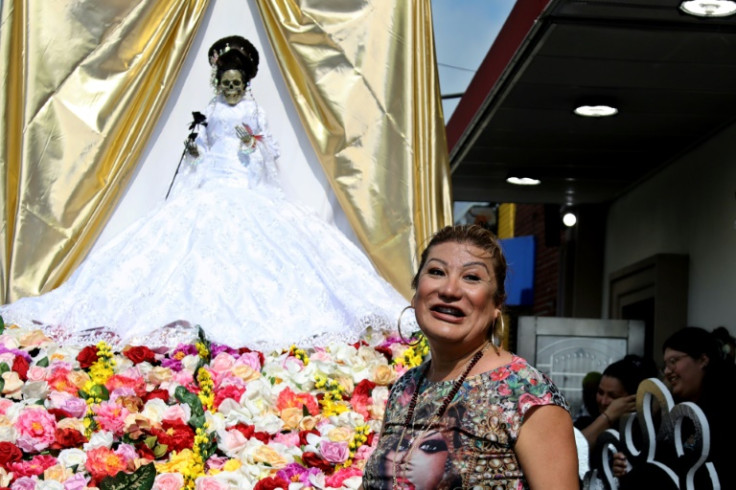 Arely Vazquez, a leader in the Santa Muerte movement in the United States, attends an annual religious procession to the folk saint in New York's Queens neighborhood