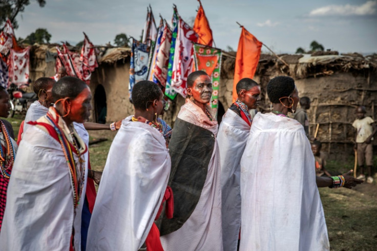 Families, local residents and officials all join the Maasai ceremony