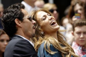 Lopez laughs next to her husband Anthony as they attend the ceremony where producer Fuller was honored with a star on the Walk of Fame in Hollywood