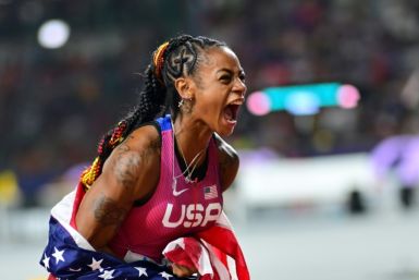 USA's Sha'Carri Richardson screams in joy after winning the women's world 100m gold