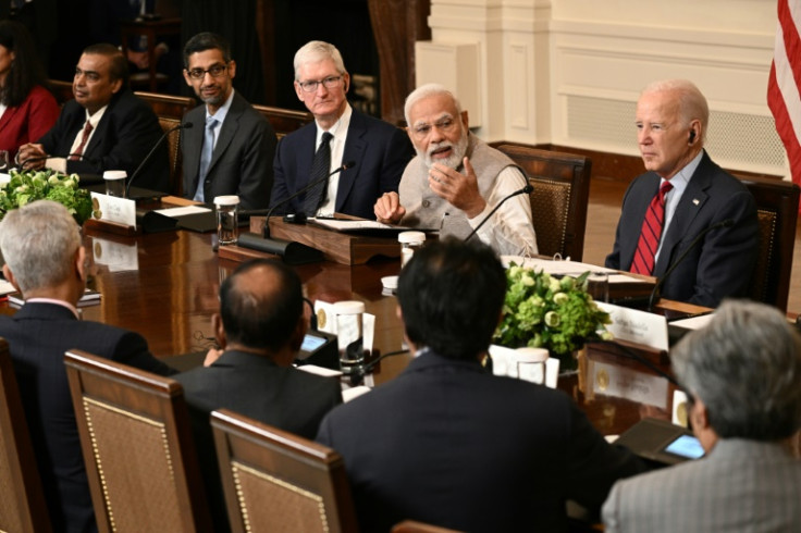 US President Joe Biden looks on as India's Prime Minister Narendra Modi speaks during a meeting with business executives at the White House on June 23, 2023