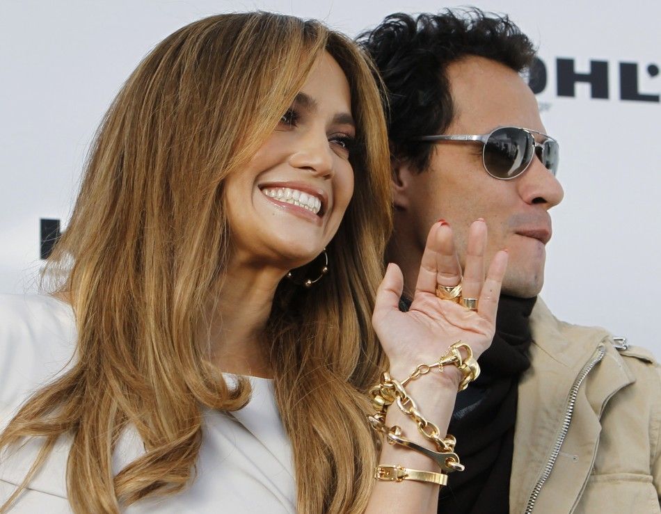 Lopez and her husband pose at a news conference to announce quotThe Jennifer Lopez and Marc Anthony quotcollections in partnership with Kohls Department Stores in California