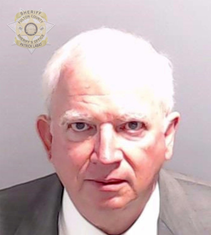 Attorney John Eastman was named as a co-defendant with the ex-president, and was booked at the same Atlanta jail where Trump is expected to turn himself in