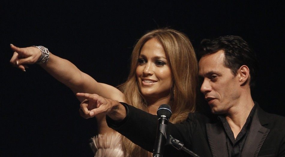 Singer Lopez and her husband Anthony attend the auction of the amfARs Cinema Against AIDS 2010 event in Antibes during the 63rd Cannes Film Festival