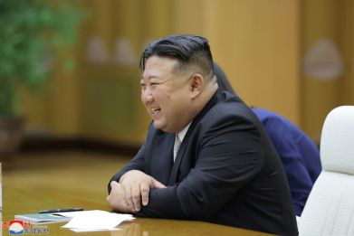 North Korean leader Kim Jong Un, pictured in a July 2023 photograph provided by KCNA, has made the development of an eye in the sky a top regime priority