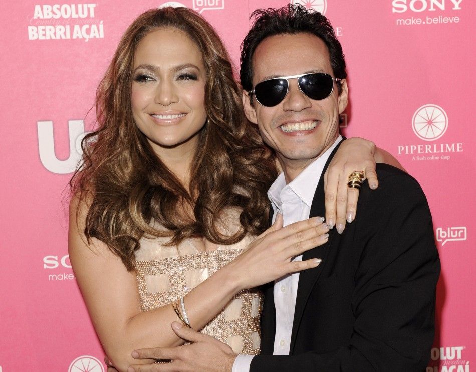 Actress Jennifer Lopez and her husband, singer Marc Anthony, arrive at the Us Weekly Hot Hollywood Style Issue Event in Hollywood, California
