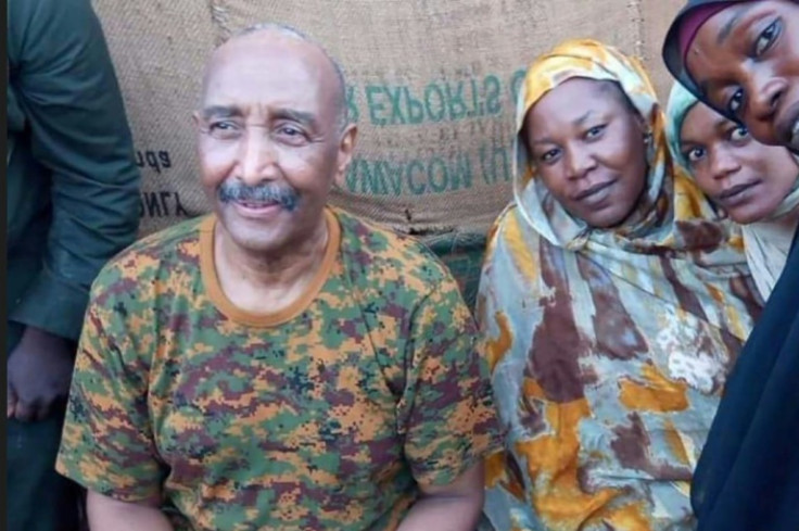 General Burhan posing with civilians in Khartoum