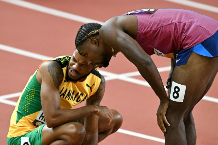 USA's Noah Lyles and Jamaica's Andrew Hudson (L) after the men's 200m semi-final