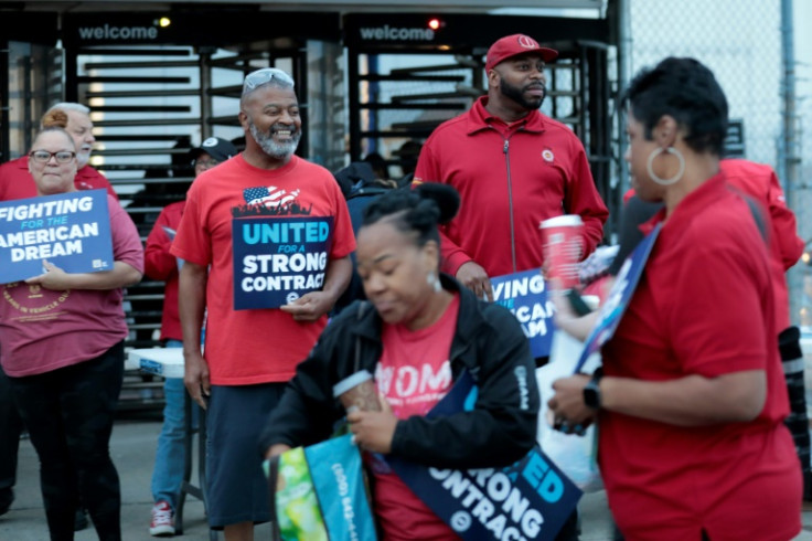 Autoworkers gather outside the Stellantis plant in Sterling Heights, Michigan, on July 12, 2023 UAW contract negotiations with Stellantis will begin on July 13; with Ford on July 14; and with General Motors on July 18. In a break with tradition, there w