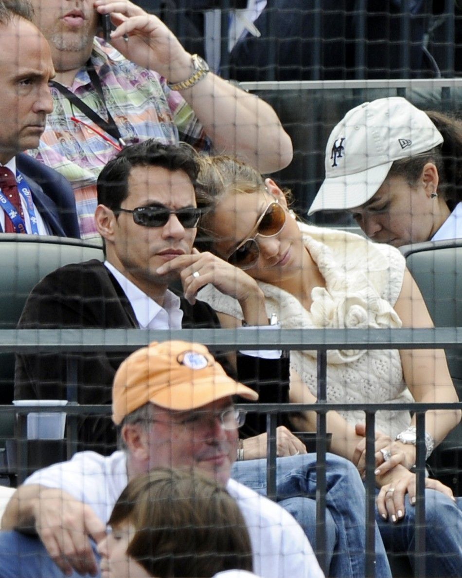 Singers Jennifer Lopez and Marc Anthony watch baseball game between Mets and Rays in New York