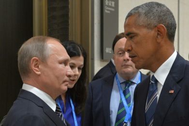 Then US president Barack Obama gazes at Russian President Vladimir Putin at the G20 Leaders Summit in Hangzhou, China on September 5, 2016.