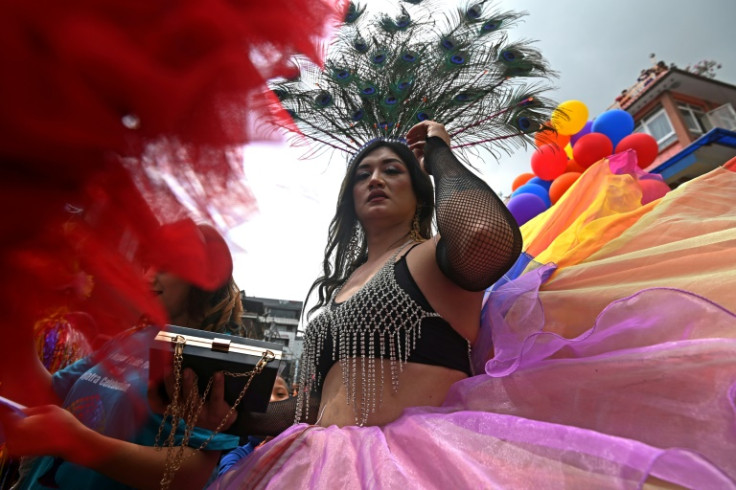 A member of LGBTQ community takes part in a Pride Parade in Kathmandu