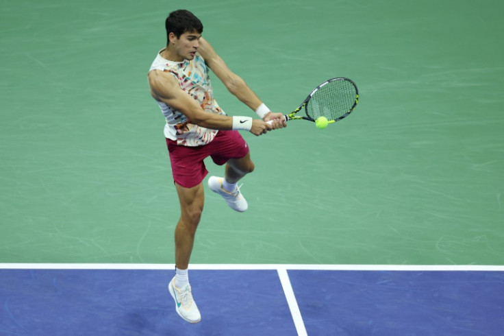 Carlos Alcaraz lashes a return against Lloyd Harris during  his second round victory at the US Open on Thursday