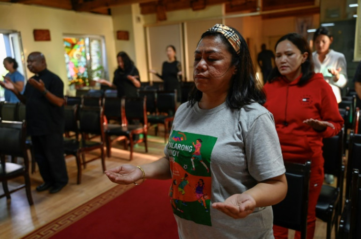 People attend a mass at Saint Thomas Aquinas Catholic Church in Ulaanbaatar