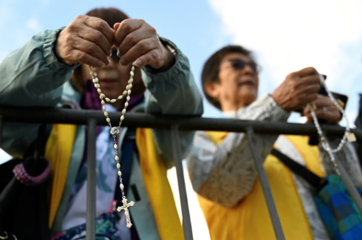 Catholic attendees at a welcome ceremony for Pope Francis in Ulaanbaatar