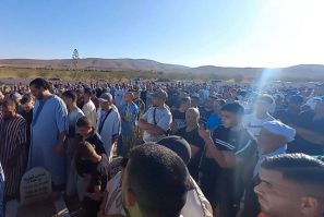 Mourners attend the funeral of Bilal Kissi, who was shot dead by the Algerian coastguard after straying across the maritime border, according to reports from Morocco