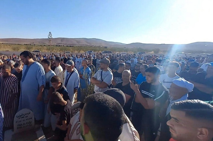 Mourners attend the funeral of Bilal Kissi, who was shot dead by the Algerian coastguard after straying across the maritime border, according to reports from Morocco