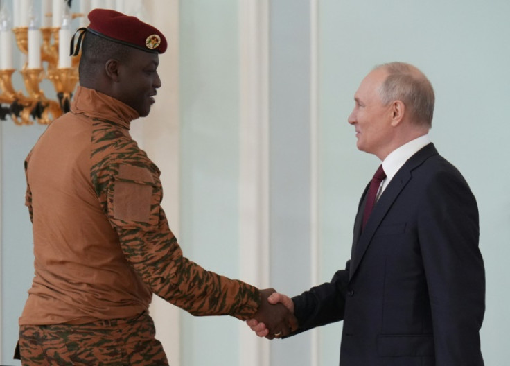 Jihadist-hit Burkina Faso is eyeing closer ties with Russia, which is providing military aid to neighbouring Mali. Pictured: Junta leader Ibrahim Traore and Russian President Vladimir Putin at the Russia-Africa summit in St. Petersburg in July