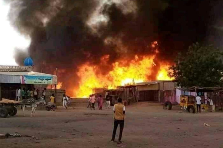 Fire rages at a livestock market in al-Fasher, the capital of Sudan's North Darfur state, after bombardment by the paramilitary Rapid Support Forces