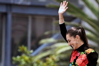 Former Mexico City mayor and presidential hopeful Claudia Sheinbaum waves to supporters