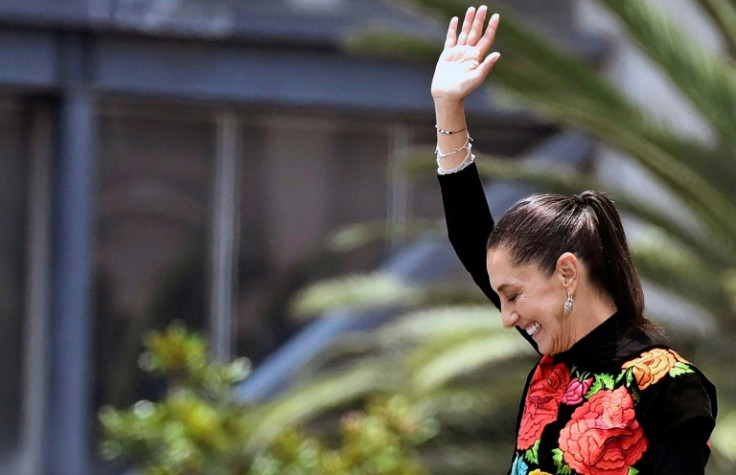 Former Mexico City mayor and presidential hopeful Claudia Sheinbaum waves to supporters