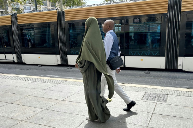 The French government won court backing for its ban on abayas from schools