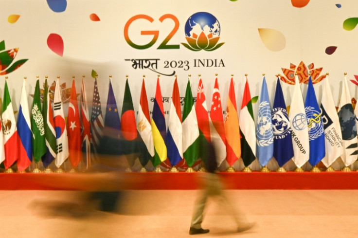 Flags of participating countries are seen inside the international media centre at the G20 summit venue, ahead of its start in New Delhi