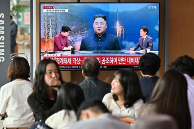 A television broadcast with file footage of North Korea's leader Kim Jong Un in Seoul in May 2023