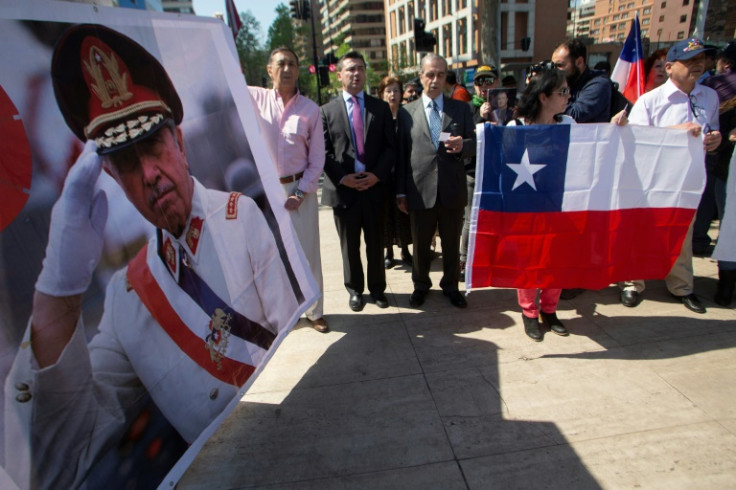 Supporters of Chilean dictator Augusto Pinochet demonstrate on the 30th anniversary of the plebiscite that ended his rule (1973-1990) in Santiago on October 5, 2018