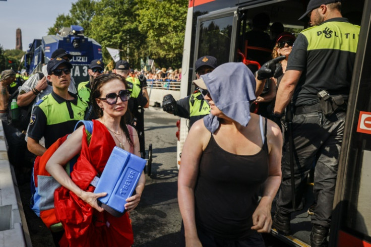 'Game of Thrones' actress Carice van Houten (l) is arrested and by police officers on Saturday